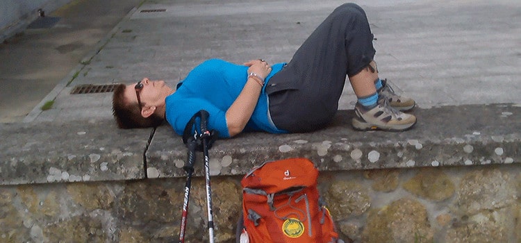 pilgrim laying down on the Camino