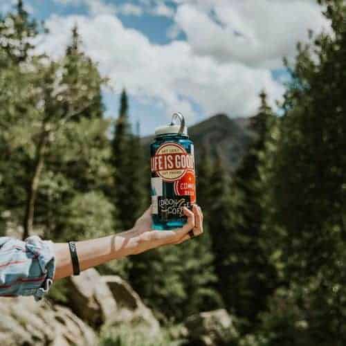 a nalgene water bottle on a hike