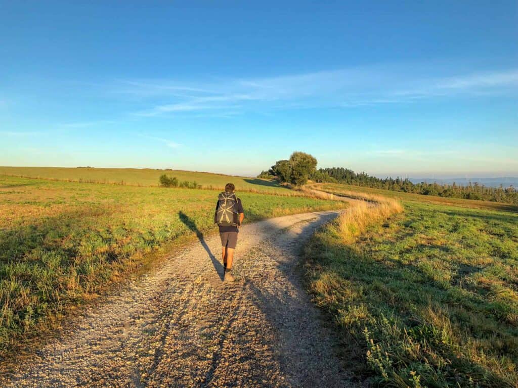 A man walking the Camino Portugal route