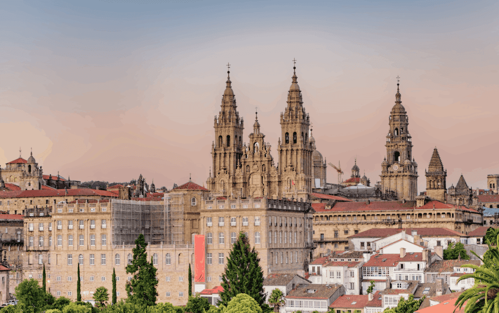 Santiago de Compostela with catedral appearing through the building - sunset