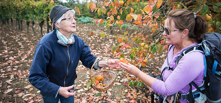 local woman talks to pilgrim