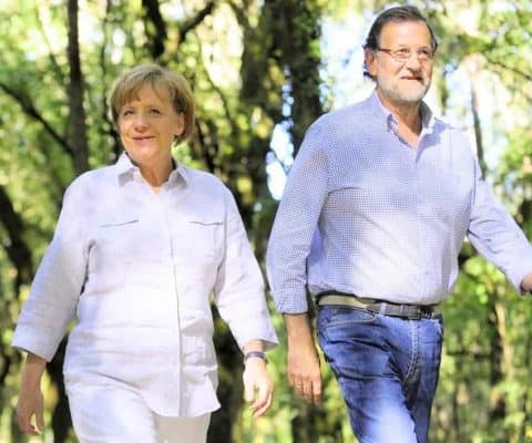 angela merkel and rajoy walking the camino