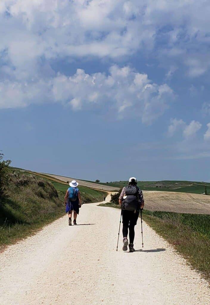 pilgrims walking on the camino frances 