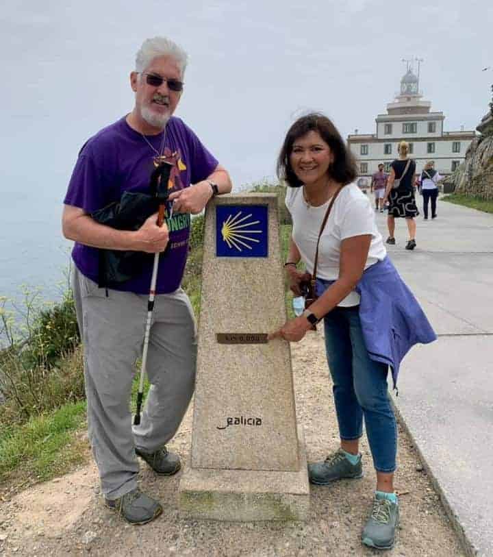 Ken and Rory at the 0km marker at finisterre - the end of the Camino