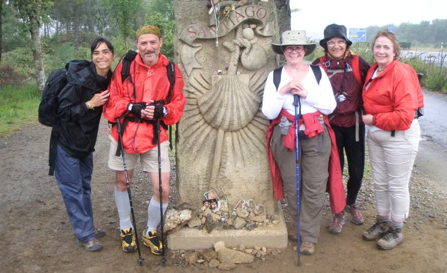 Group of pilgrims in front of monument
