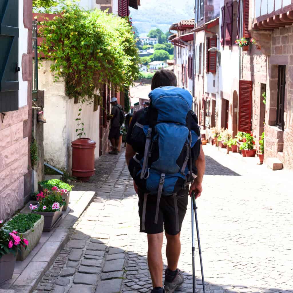 Pilgrim walking through saint jean pied de port